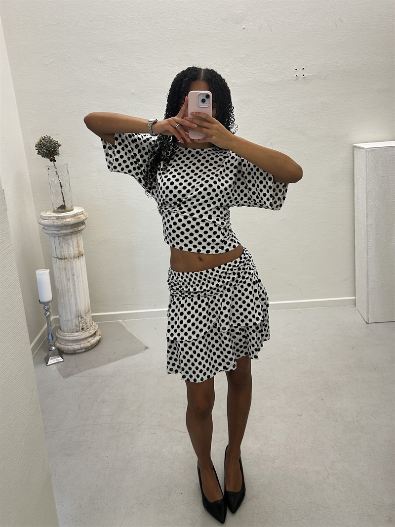 Grunt Nova Top – Trendy top til piger med moderne look i hvid 